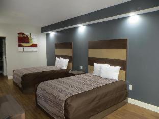 Grand Villa Inn & Suites Chinatown Houston Zimmer foto